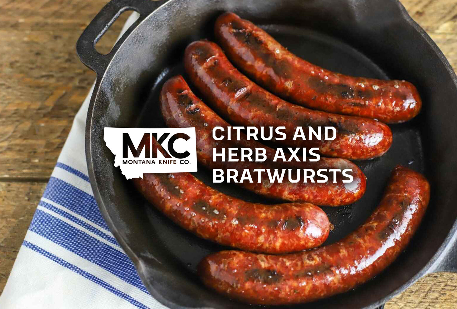 Cooked bratwurst venison sausages seasoned with citrus and herbs in a cast iron skillet, with the MKC logo over the image.