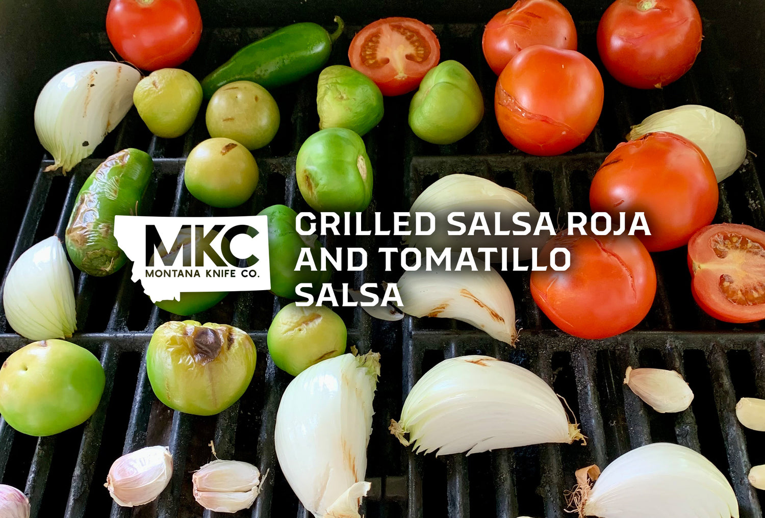 Tomatoes, onions, tomatillos, and garlic, the ingredients for Salsa Roja and Tomatillo Salsa, roasting on a grill.