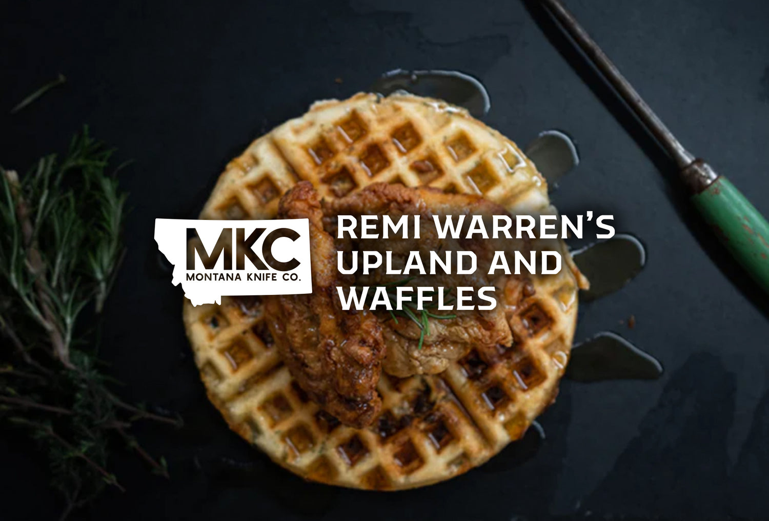 A top-down view of a waffle topped with a fried piece of upland game and maple syrup.