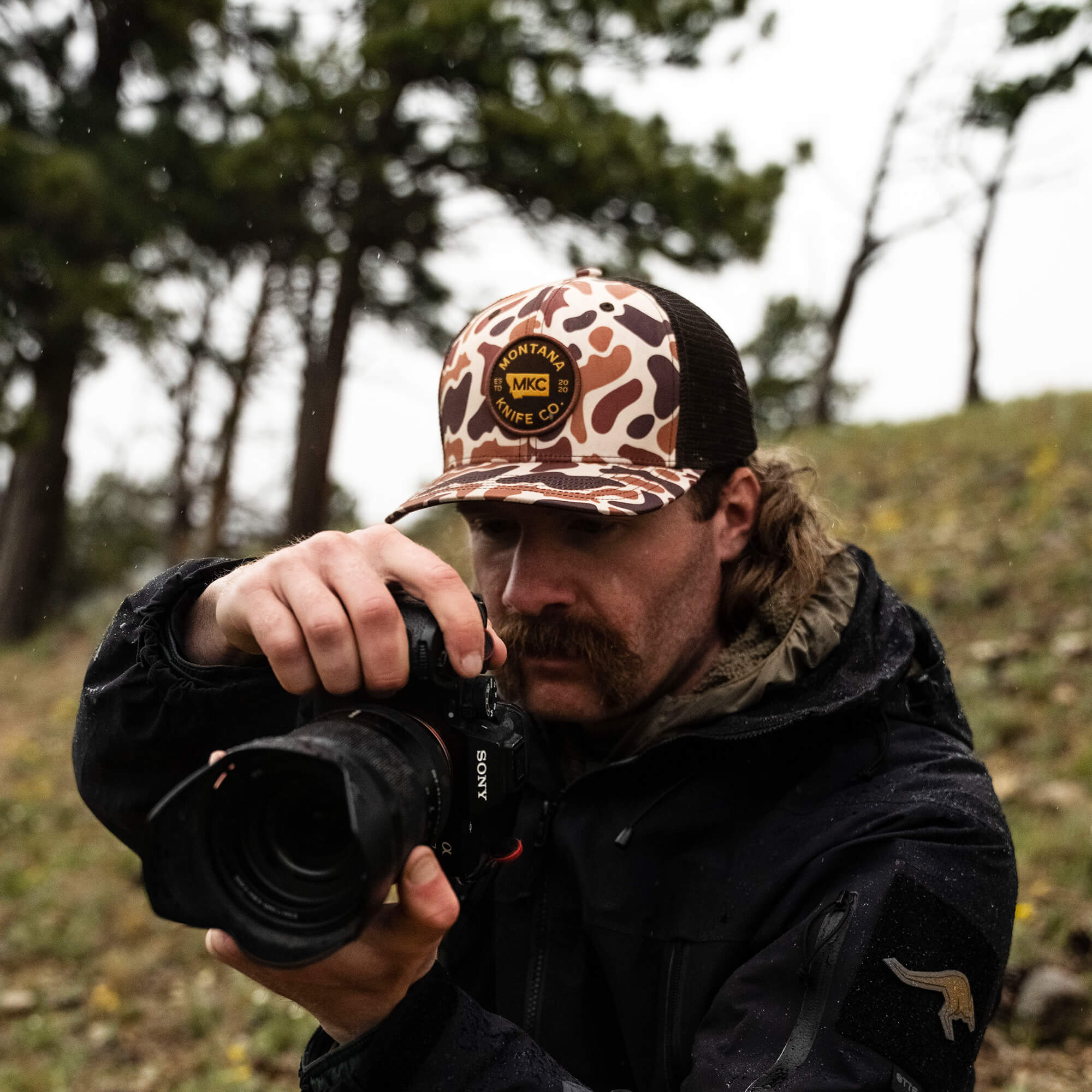 MKC VINTAGE CAMO TRUCKER HAT